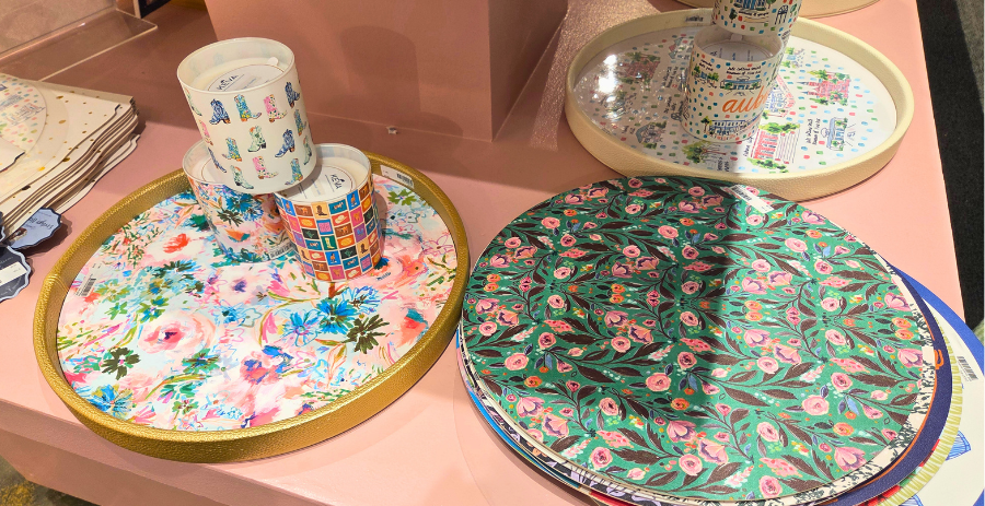 Keva tray with reversible and interchangeable placemat inserts.