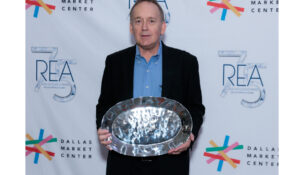 Chuck Fraelich accepted the award for Manufacturer of the Year for Tag. (Photo by Ariel Perez)